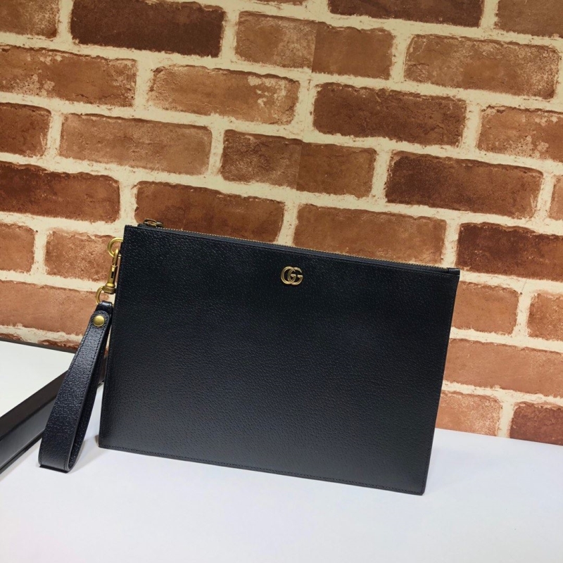 G*u*i clutch bags